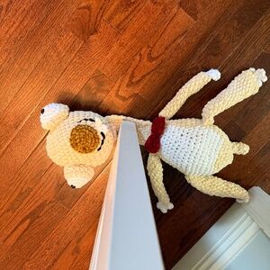 Velvet soft Squished sloth hand crocheted door stop